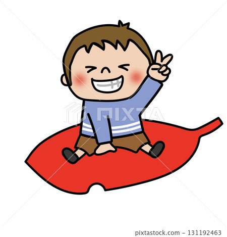 孩子騎在一片大落葉上（男孩 1） 131192463