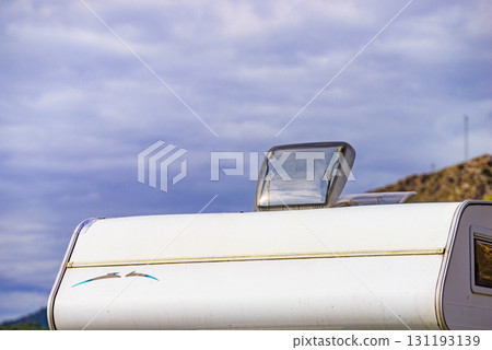 Sunroof, raisable window on roof top of caravan 131193139