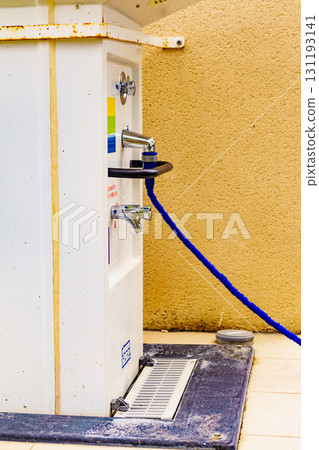 Caravan service. Refilling camper rv water tank. 131193141