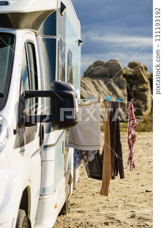 Washing laundry hanging to dry outdoors at caravan Washing laundry hanging to dry outdoors at caravan 131193192