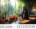 Black electric fryer sits on a wooden countertop next to a bowl of fruit 131193598