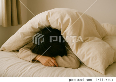 A woman who can't get out of bed because it's too cold 131193704