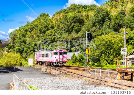 The tourist train SAKU MiSAKU Raku 3 bound for Tsuyama Station departs from Kameko Station in early autumn in Misaki Town, Kume District, Okayama Prefecture. The tourist train SAKU MiSAKU Raku 3 bound for Tsuyama Station departs from Kameko Station in early autumn in Misaki Town, Kume District, Okayama Prefecture. 131193716