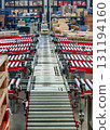 logistic warehouse. packing line in a logistics warehouse. conveyor belt in a modern production line 131194160