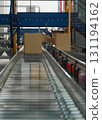 logistic warehouse. packing line in a logistics warehouse. conveyor belt in a modern production line 131194162