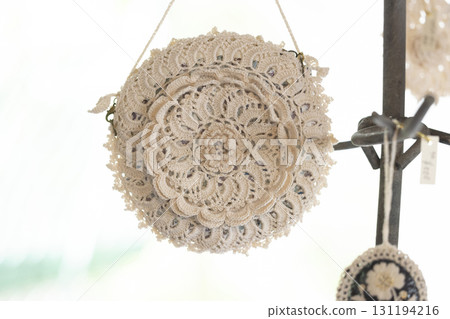 A cute pouch made from lace knitting A cute pouch made from lace knitting 131194216