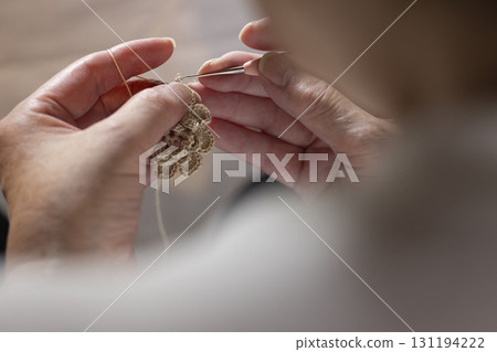 Mom's hands knitting lace 131194222