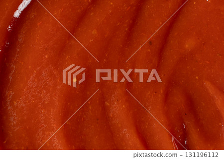 Red Ketchup Surface Close-Up. Ingredient Background for Design. Red Ketchup Surface Close-Up. Ingredient Background for Design. 131196112