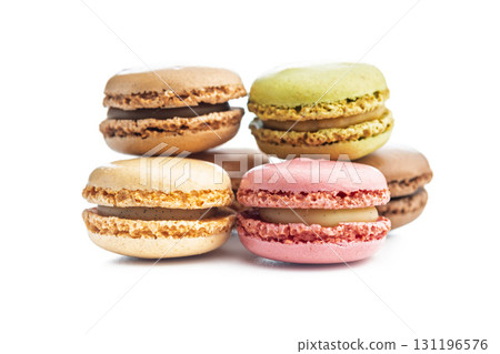 Different flavors of macarons. Colourful macaroons isolated on white background. 131196576