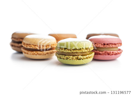 Different flavors of macarons. Colourful macaroons isolated on white background. 131196577