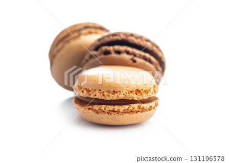 Different flavors of macarons. Colourful macaroons isolated on white background. 131196578