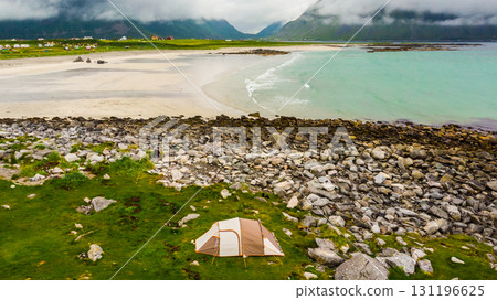 Tent on sea shore, Skagsanden Beach Lofoten Norway Tent on sea shore, Skagsanden Beach Lofoten Norway 131196625