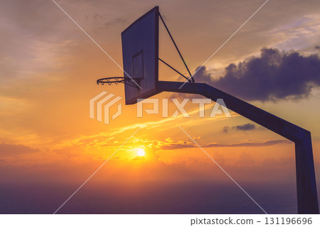 basketball basket against sunset sky 131196696