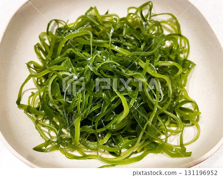 4 pieces of parboiled salted kelp that have been rehydrated 131196952