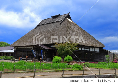 Towada City, Aomori Prefecture: An old thatched roof house remaining in the Satoyama area (Aomori) Towada City, Aomori Prefecture: An old thatched roof house remaining in the Satoyama area (Aomori) 131197015