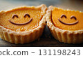 Delight in a Happy Smiling Tart Dessert that features a delicious Pumpkin Filling inside 131198243