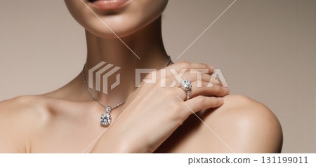Elegant jewelry close-up showcasing diamond necklaces and rings in luxury fashion style Elegant jewelry close-up showcasing diamond necklaces and rings in luxury fashion style 131199011