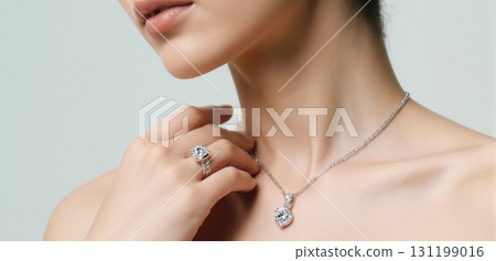 Elegant jewelry close-up showcasing diamond necklaces and rings in luxury fashion style Elegant jewelry close-up showcasing diamond necklaces and rings in luxury fashion style 131199016