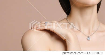 Elegant jewelry close-up showcasing diamond necklaces and rings in luxury fashion style 131199019