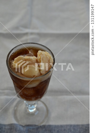 A sweet, cold and deliciously refreshing cola float 131199147