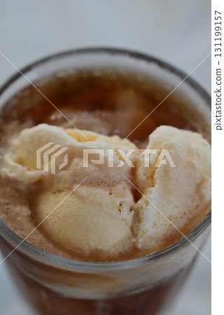 A sweet, cold and deliciously refreshing cola float A sweet, cold and deliciously refreshing cola float 131199157