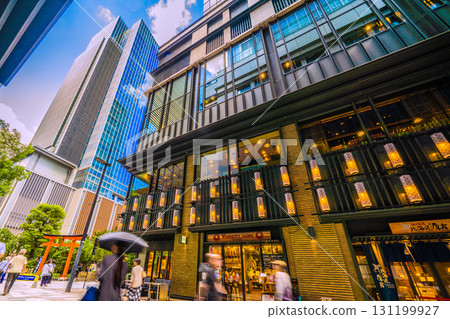 Tokyo cityscape in Japan, with views of Fukutoku Shrine in the valley between buildings in Nihonbashi Muromachi. Today, September 24th, is Ichirimanbai Day. 131199927