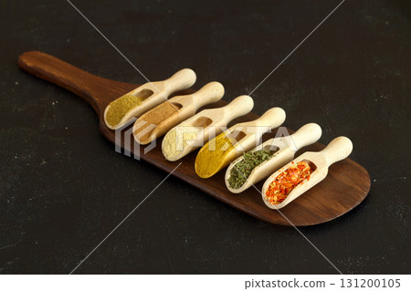Big set of Indian spices on wooden table. Top view, Horizontal image. Big set of Indian spices on wooden table. Top view, Horizontal image. 131200105