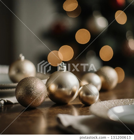 Glistening golden ornaments rest on a wooden table, surrounded by shimmering bokeh lights from a decorated Christmas tree, setting a warm and inviting holiday mood Generative AI 131200613