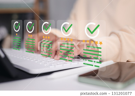 Customer Review Rating and Online Feedback Concept with Digital Stars and Check Marks on Keyboard Customer Review Rating and Online Feedback Concept with Digital Stars and Check Marks on Keyboard 131201077
