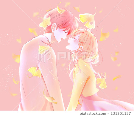 A man and woman laughing facing each other in autumn, ginkgo trees 131201137