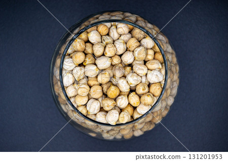 Beautiful organic dried chickpea beans consisting of raw bengal legume pea Beautiful organic dried chickpea beans consisting of raw bengal legume pea 131201953