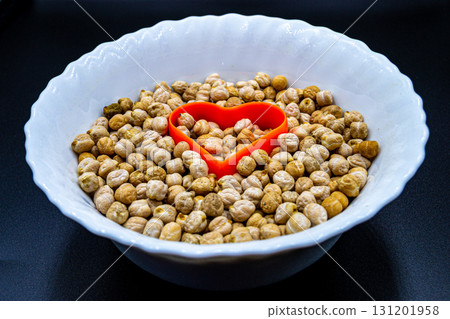 Beautiful organic dried chickpea beans consisting of raw bengal legume pea 131201958