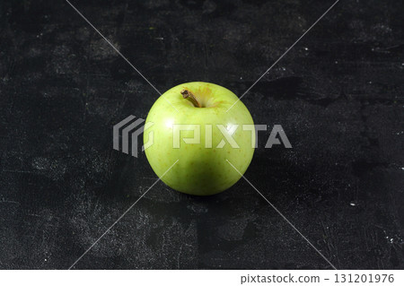 green apple healthy fruit on black background 131201976