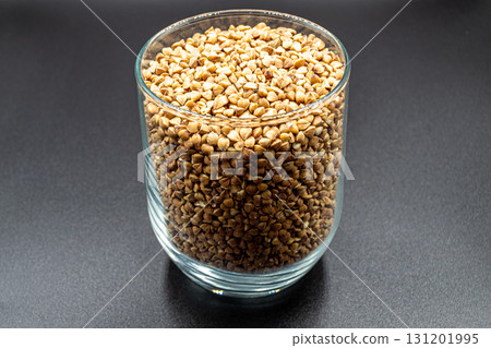 Organic dry buckwheat grains consisting of raw natural product 131201995