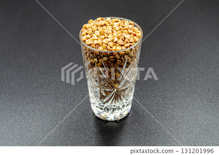 Organic dry buckwheat grains consisting of raw natural product Organic dry buckwheat grains consisting of raw natural product 131201996