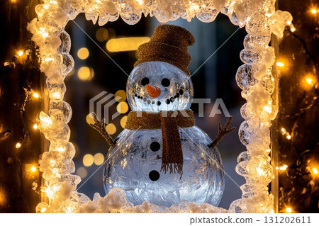 Beautiful glass and ice snowman illuminated by soft lights in a winter wonderland setting 131202611