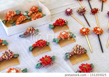 Beautiful hair clips with flowers in Japanese style. Beautiful hair clips with flowers in Japanese style. 131203025
