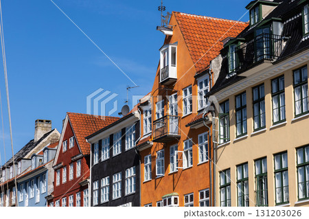 The famous Nyhavn area in the historical part of the city of Copenhagen with traditional houses and boats The famous Nyhavn area in the historical part of the city of Copenhagen with traditional houses and boats 131203026