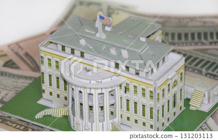 model of a white house on the background of us dollars 131203113