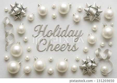 Holiday Cheers text with silver baubles and snowflakes on bright elegant white festive background. Holiday Cheers text with silver baubles and snowflakes on bright elegant white festive background. 131203650