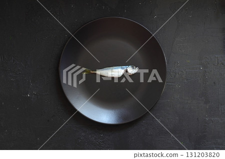 Fresh fish horse mackerel on a dark background 131203820