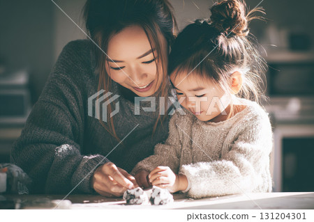 Asian mother child cozy sweater indoor natural light bonding creativity clay art happiness family togetherness smiling learning childhood parenting home love warmth hands activity concentration Asian mother child cozy sweater indoor natural light bonding creativity clay art happiness family togetherness smiling learning childhood parenting home love warmth hands activity concentration 131204301