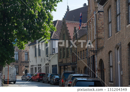 World Heritage Site: Streetscape of the Historic Centre of Bruges and Horse Chestnut Flowers / Bruges, Belgium World Heritage Site: Streetscape of the Historic Centre of Bruges and Horse Chestnut Flowers / Bruges, Belgium 131204349