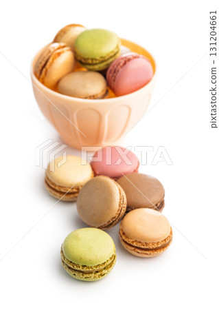 Different flavors of macarons. Colourful macaroons isolated on white background. 131204661