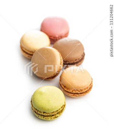 Different flavors of macarons. Colourful macaroons isolated on white background. 131204662