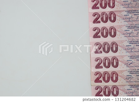 Turkish Lira banknotes of various color, pattern and value on white background Turkish Lira banknotes of various color, pattern and value on white background 131204682