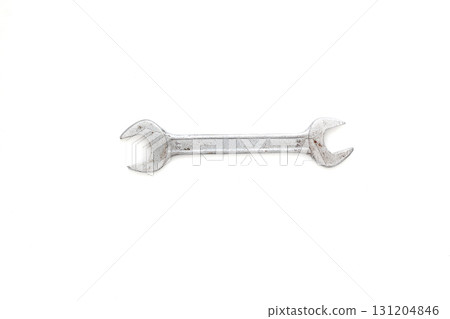 Rusty metal wrench. Grunge spanner isolated on white. Mechanic tool background Rusty metal wrench. Grunge spanner isolated on white. Mechanic tool background 131204846