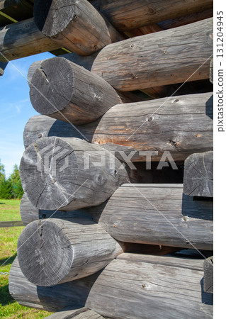 Corner of Wooden Log Cabin with Notched Joint, Close-Up 131204945