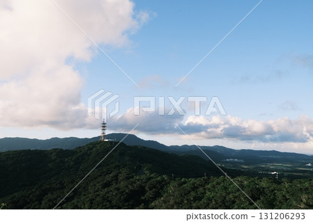 Steel tower standing on the mountain 131206293