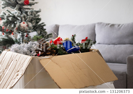 Preparing to decorate Christmas tree at home Preparing to decorate Christmas tree at home 131206373